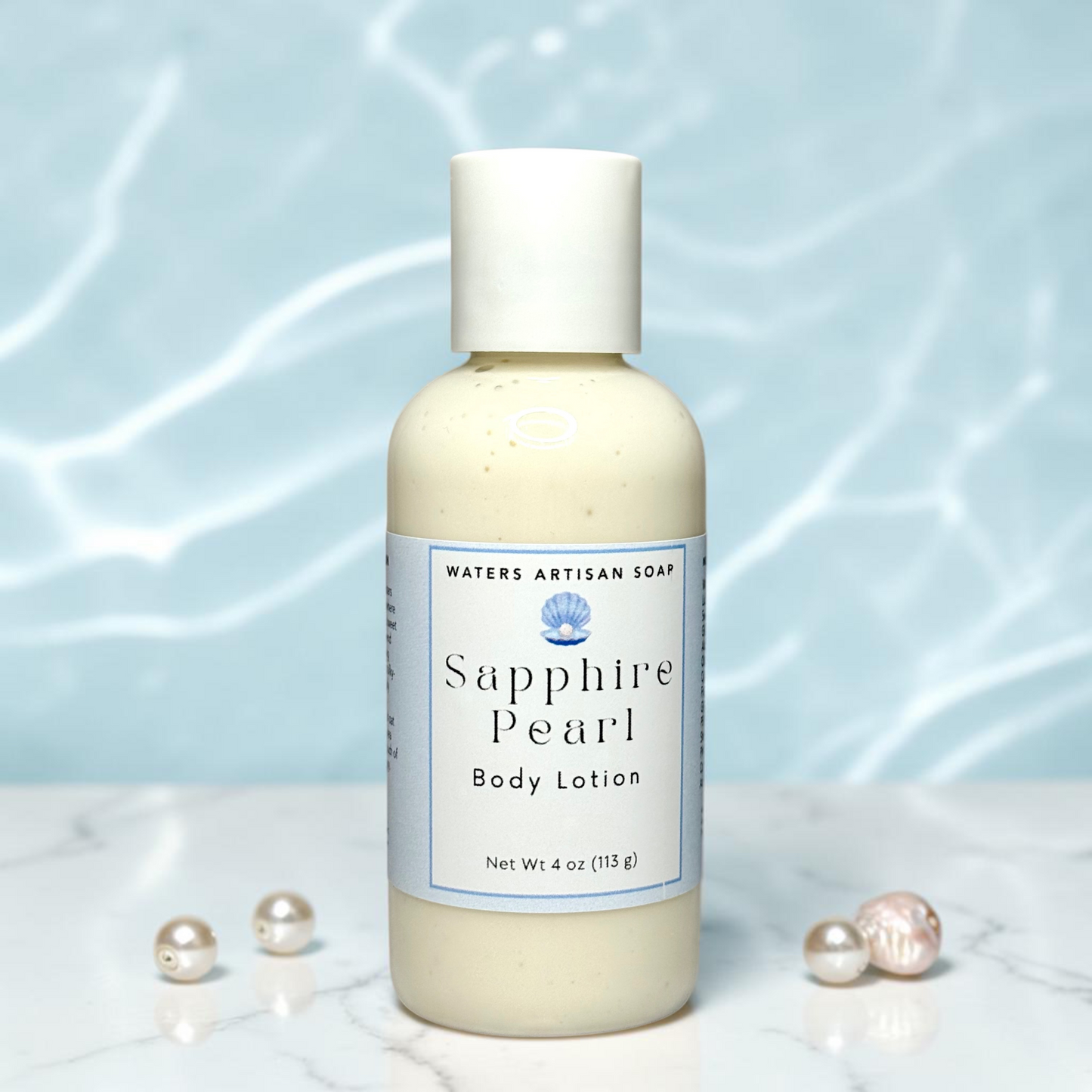 Small Batch Vegan Body Lotion Handmade Shea Butter Aloe Vera Moisturizer Four Ounce Clear Bottle White Flip Top Pale Blue Label Rice Bran Sweet Almond Oil Hydrolyzed Oat Protein Grapefruit Peach Coconut Water Floral Amber Sandalwood Musk